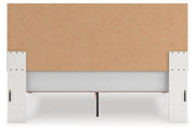 Zuraleus King Upholstered Panel Platform Bed