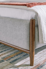 Lyncott Queen Upholstered Panel Bed