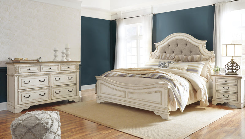 Realyn King Upholstered Panel Bed and Dresser