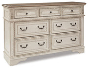 Realyn Queen Upholstered Storage Bed, Dresser, Chest and Nightstand