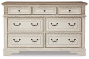 Realyn Queen Upholstered Storage Bed, Dresser, Chest and Nightstand