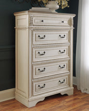 Realyn King Panel Upholstered Bed, Dresser, Mirror and Chest