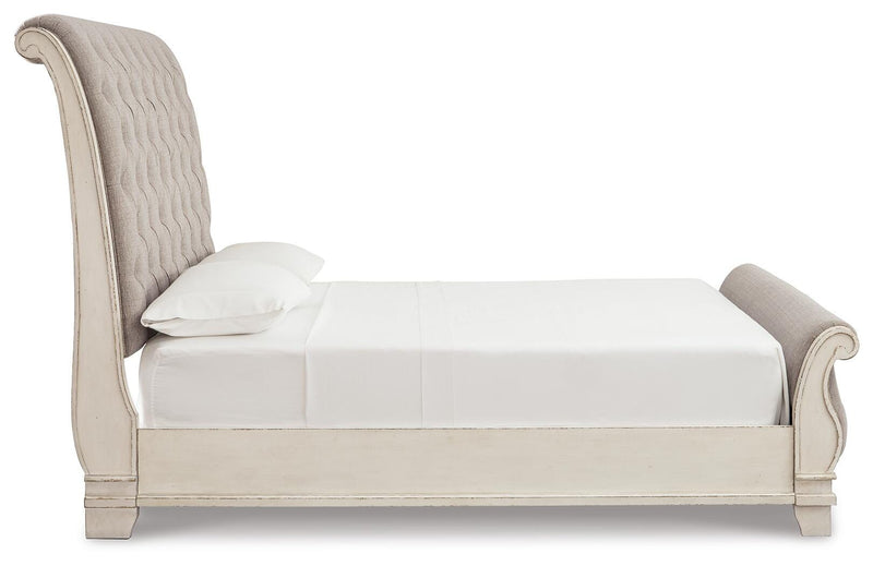 Realyn Queen Upholstered Sleigh Bed and Chest
