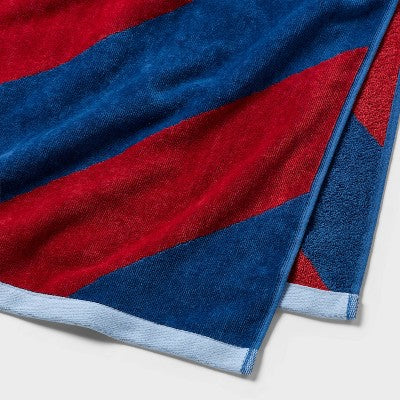 36"x72" Reversible Diagonal Striped Oversized Beach Towel Blue/Red - Room Essentials