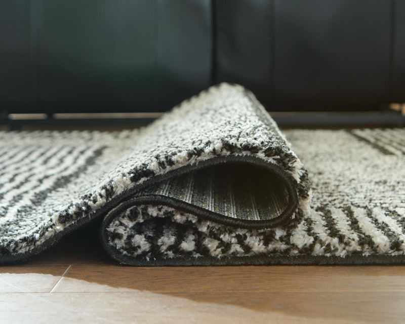 Kurtmen 7'10" x 9'10" Area Rug