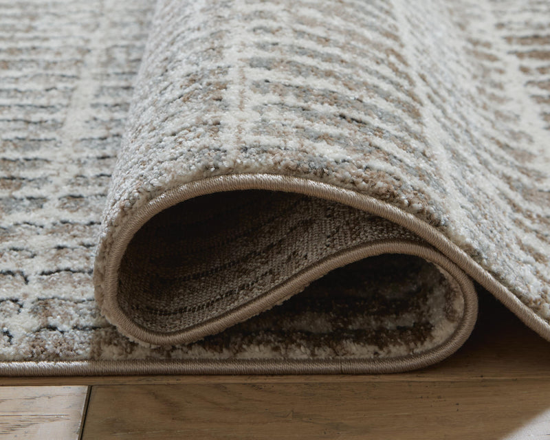 Fuadwick 7'10" x 10' Area Rug