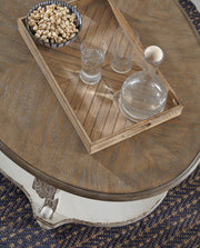 Realyn Coffee Table and 2 End Tables